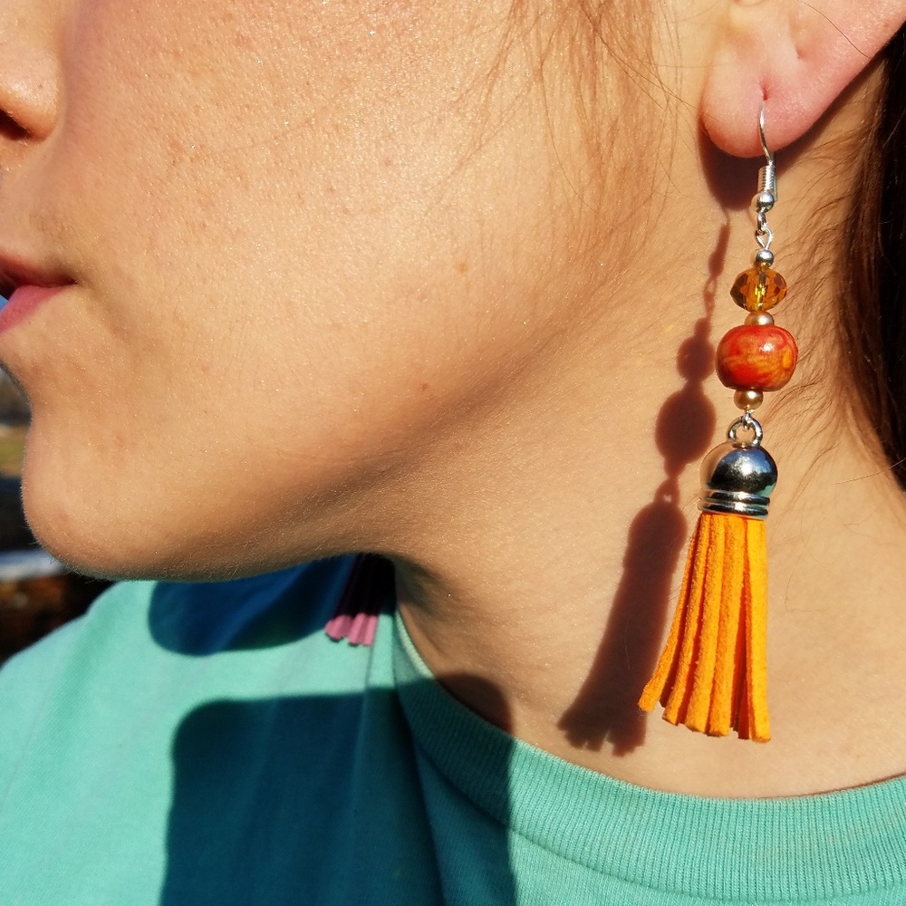 Orange tassled earrings
